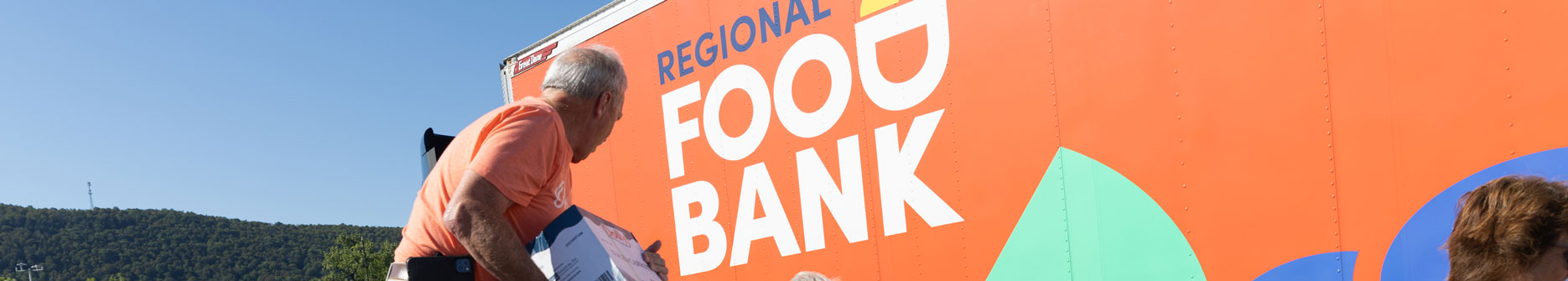 Regional Food Bank Salvation Army Food distribution - unloading a truck