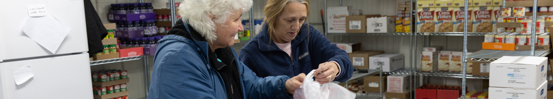 RFB Davenport Food distribution two ladies putting food in bags